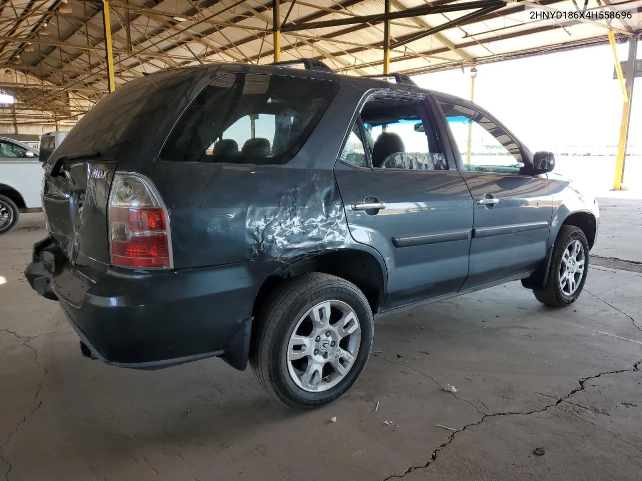 2004 Acura Mdx Touring VIN: 2HNYD186X4H558696 Lot: 54554074