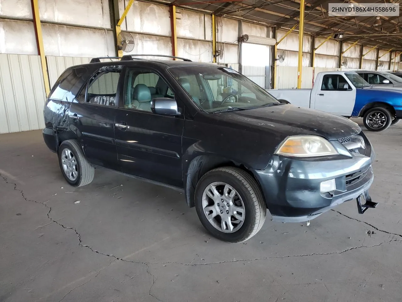 2004 Acura Mdx Touring VIN: 2HNYD186X4H558696 Lot: 54554074