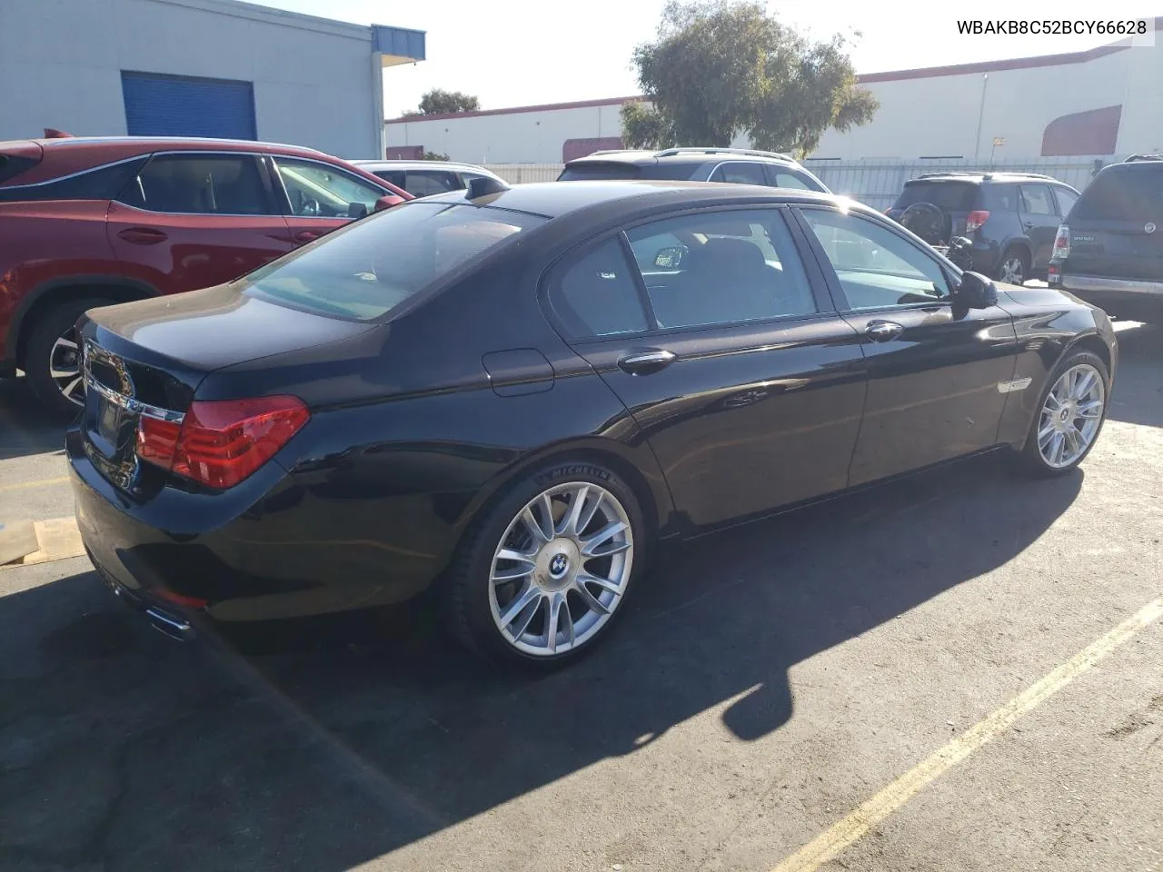 2011 BMW 750 Li VIN: WBAKB8C52BCY66628 Lot: 77191054