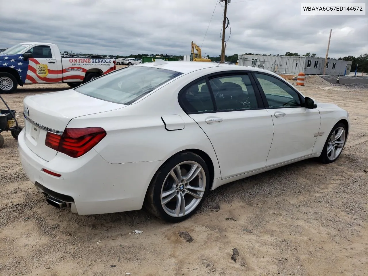 2014 BMW 740 I VIN: WBAYA6C57ED144572 Lot: 70323644