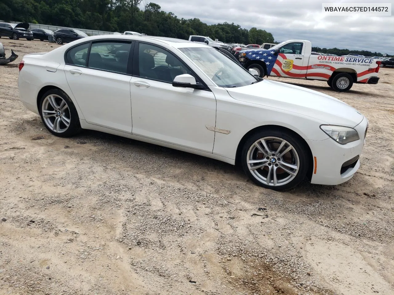 2014 BMW 740 I VIN: WBAYA6C57ED144572 Lot: 70323644