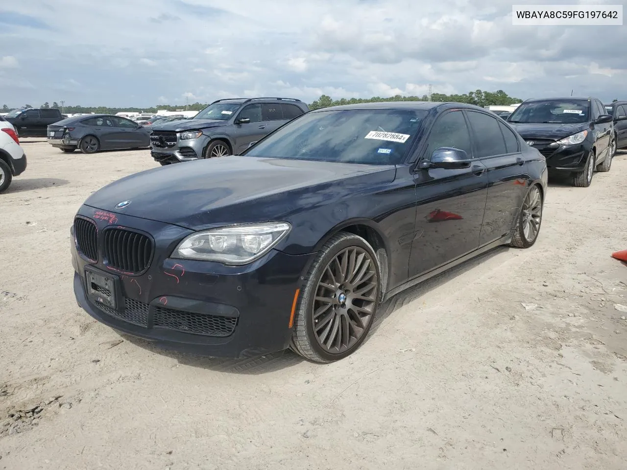 2015 BMW 750 I VIN: WBAYA8C59FG197642 Lot: 70282884