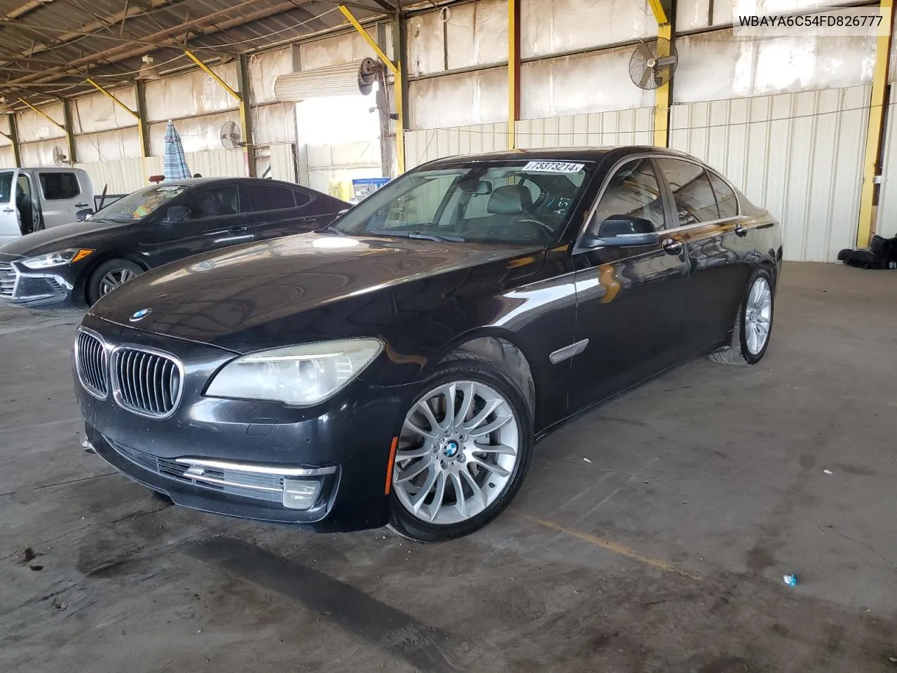 2015 BMW 740 I VIN: WBAYA6C54FD826777 Lot: 73373214