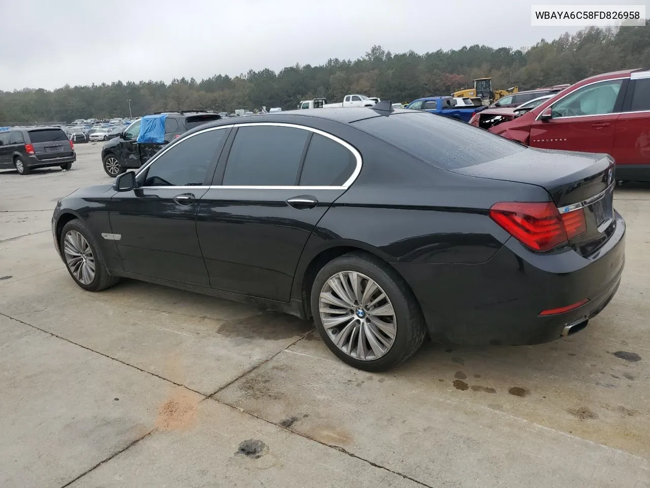 2015 BMW 740 I VIN: WBAYA6C58FD826958 Lot: 76982354