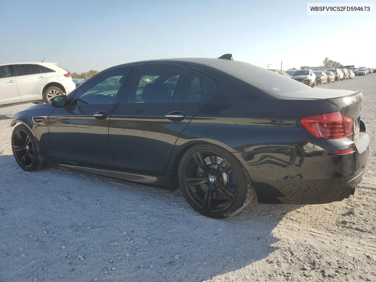 2015 BMW M5 VIN: WBSFV9C52FD594673 Lot: 77460894