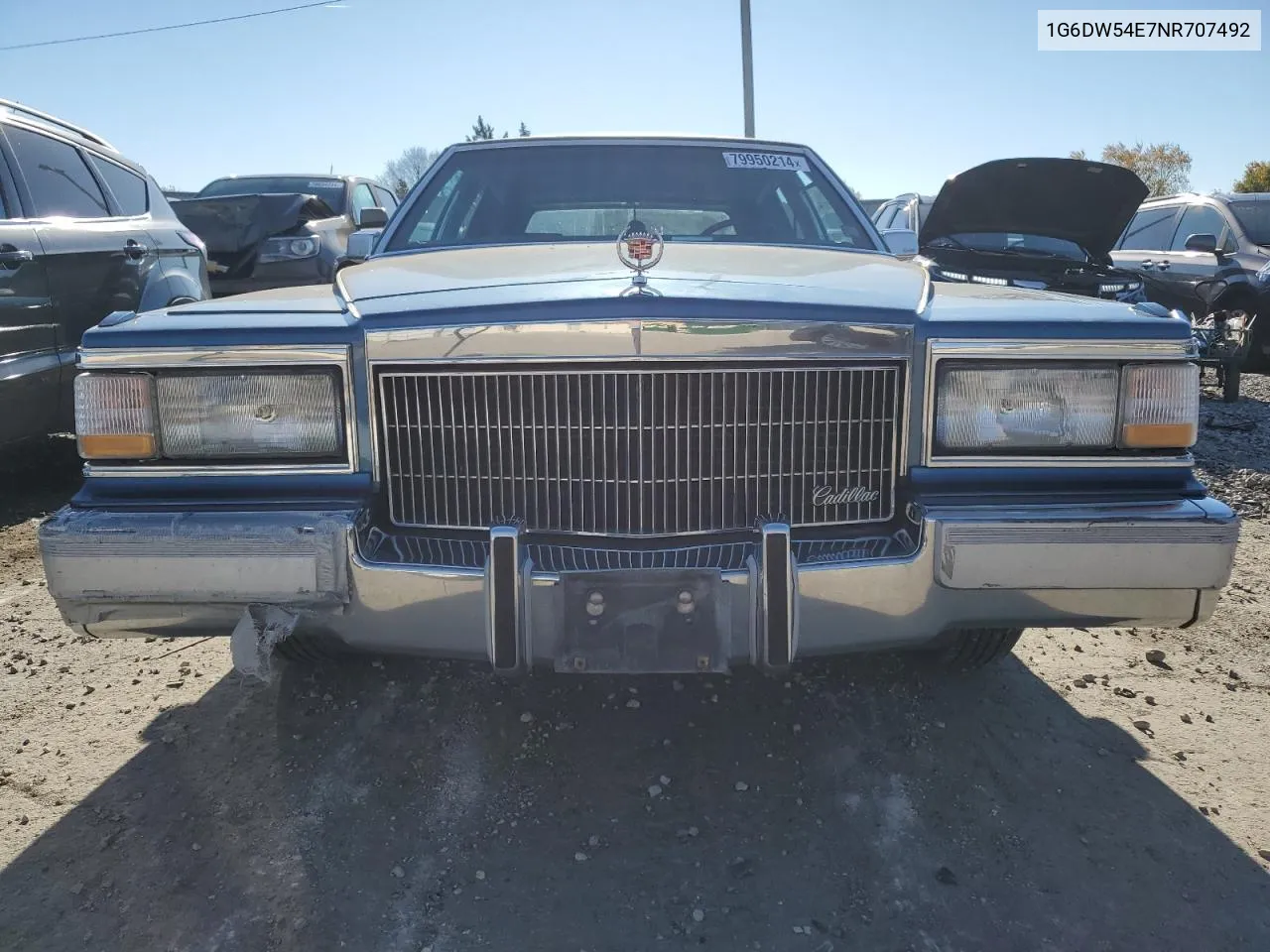 1992 Cadillac Brougham VIN: 1G6DW54E7NR707492 Lot: 79950214