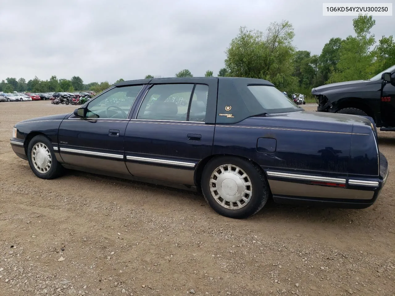 1997 Cadillac Deville VIN: 1G6KD54Y2VU300250 Lot: 66253444