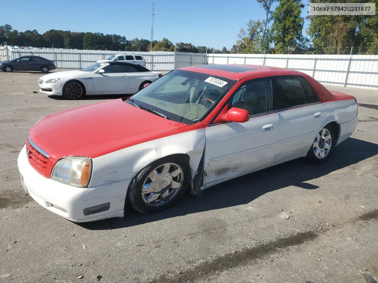 2002 Cadillac Deville Dts VIN: 1G6KF57942U231877 Lot: 76724554