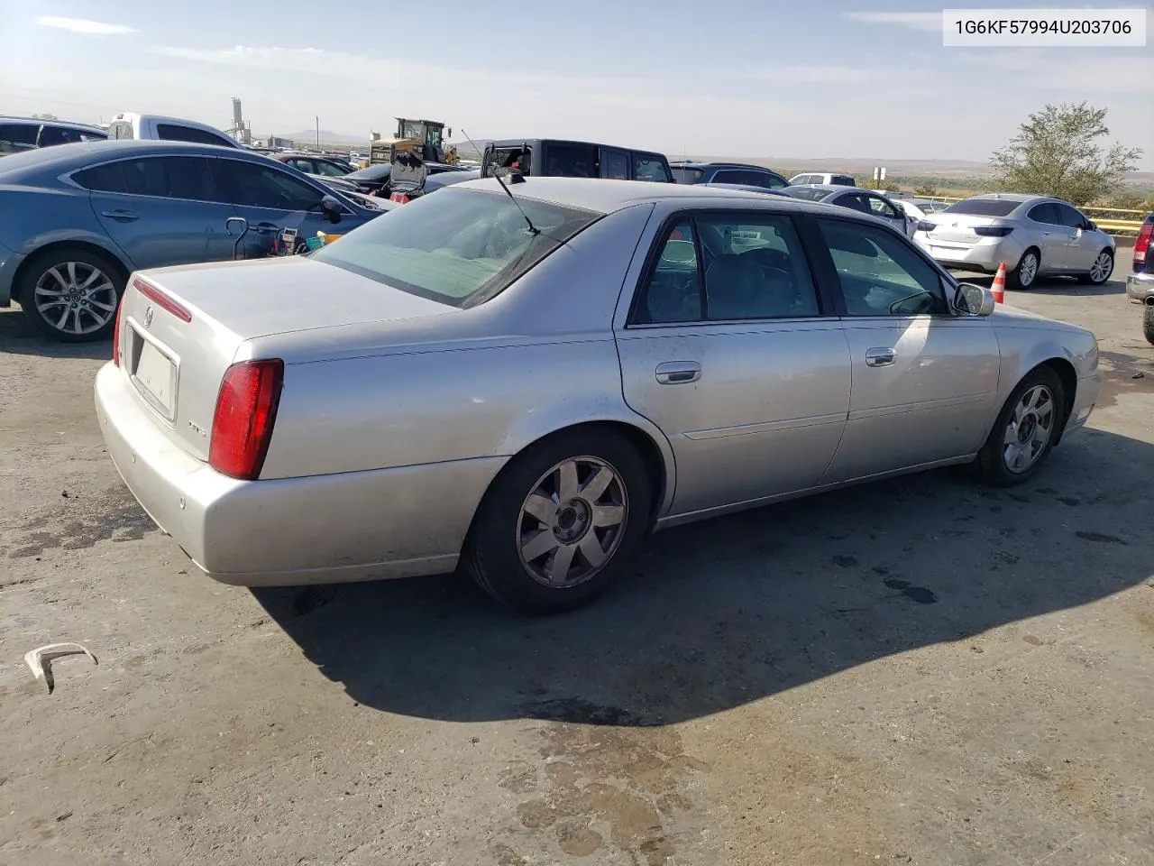 2004 Cadillac Deville Dts VIN: 1G6KF57994U203706 Lot: 76278324