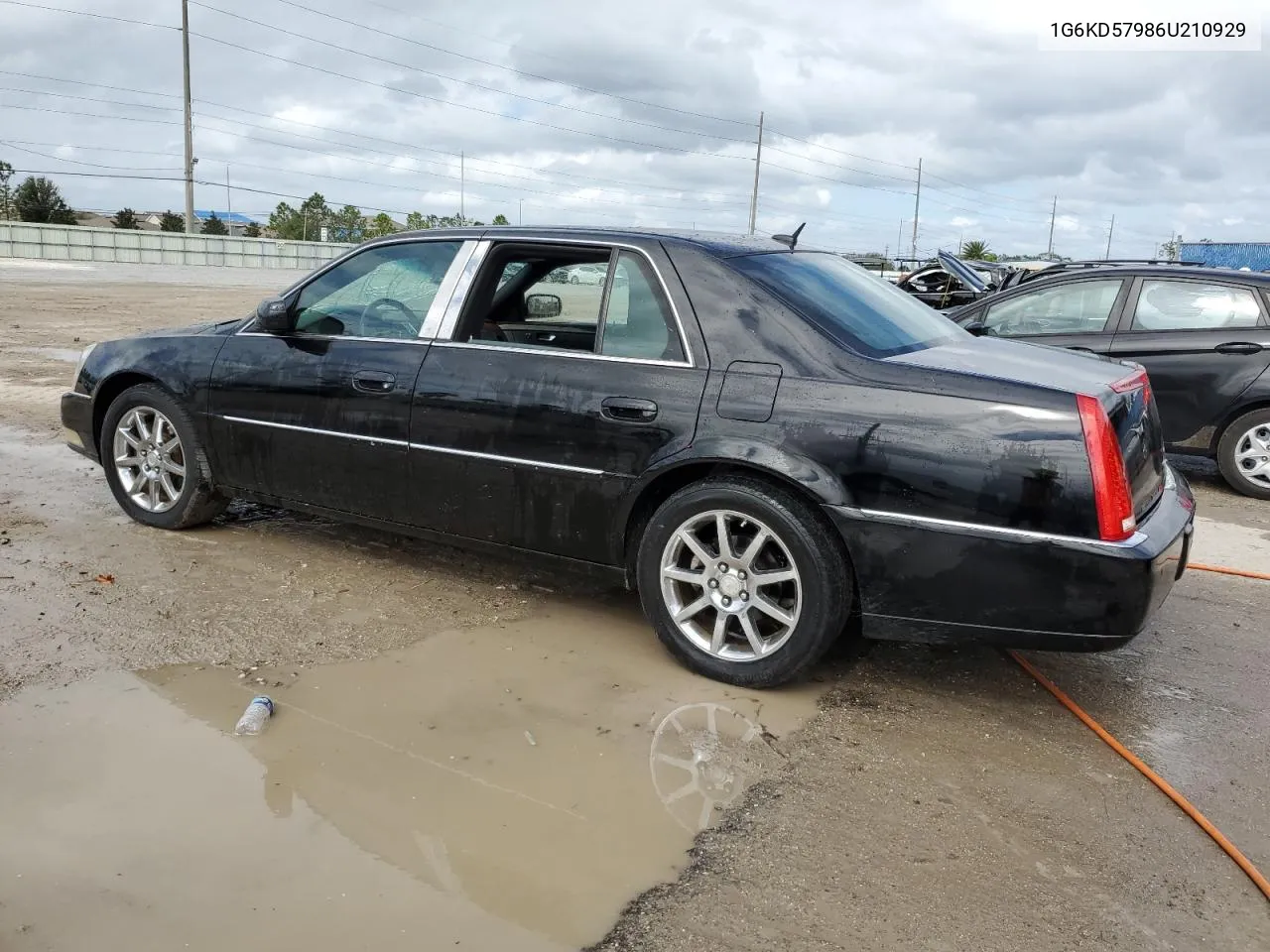 2006 Cadillac Dts VIN: 1G6KD57986U210929 Lot: 79542454