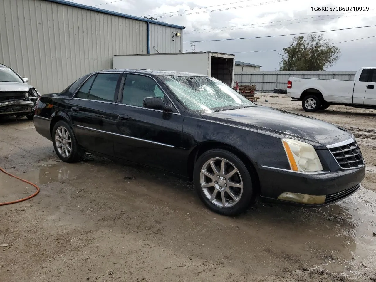 2006 Cadillac Dts VIN: 1G6KD57986U210929 Lot: 79542454