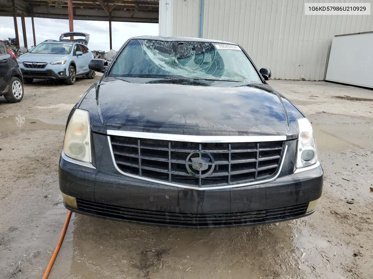 2006 Cadillac Dts VIN: 1G6KD57986U210929 Lot: 79542454