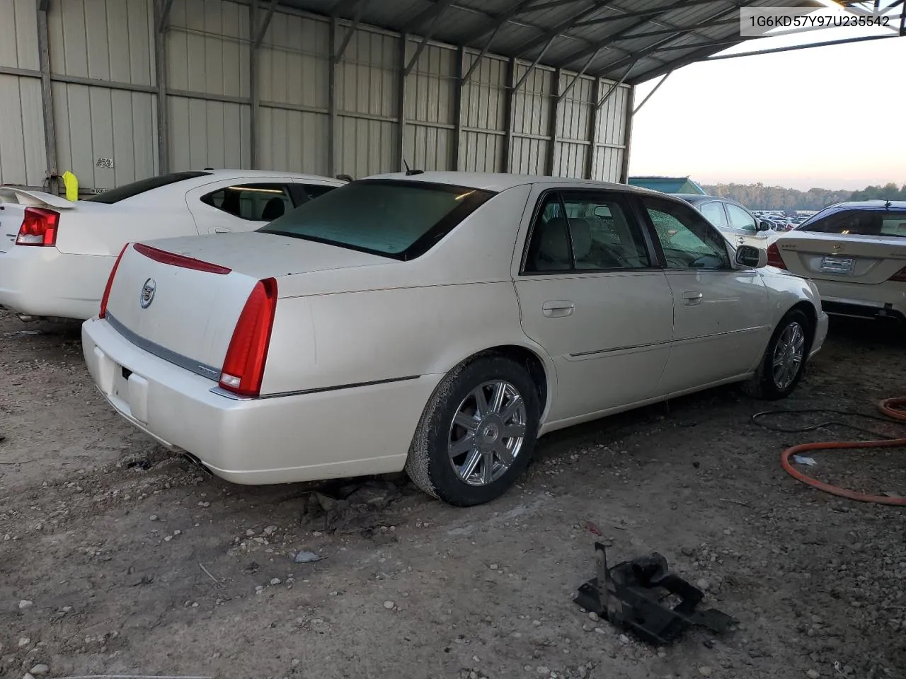 2007 Cadillac Dts VIN: 1G6KD57Y97U235542 Lot: 73356784