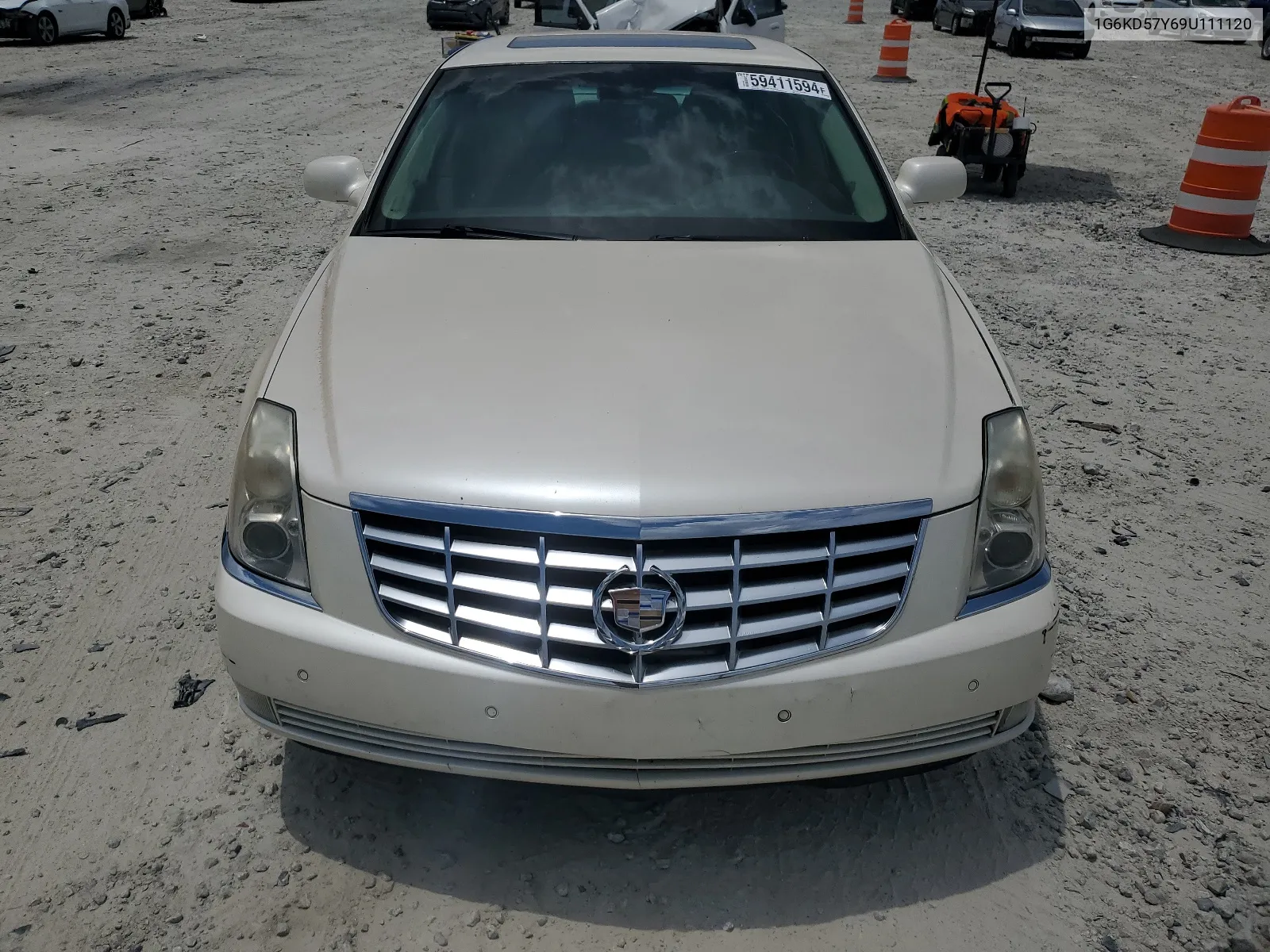 2009 Cadillac Dts VIN: 1G6KD57Y69U111120 Lot: 59411594