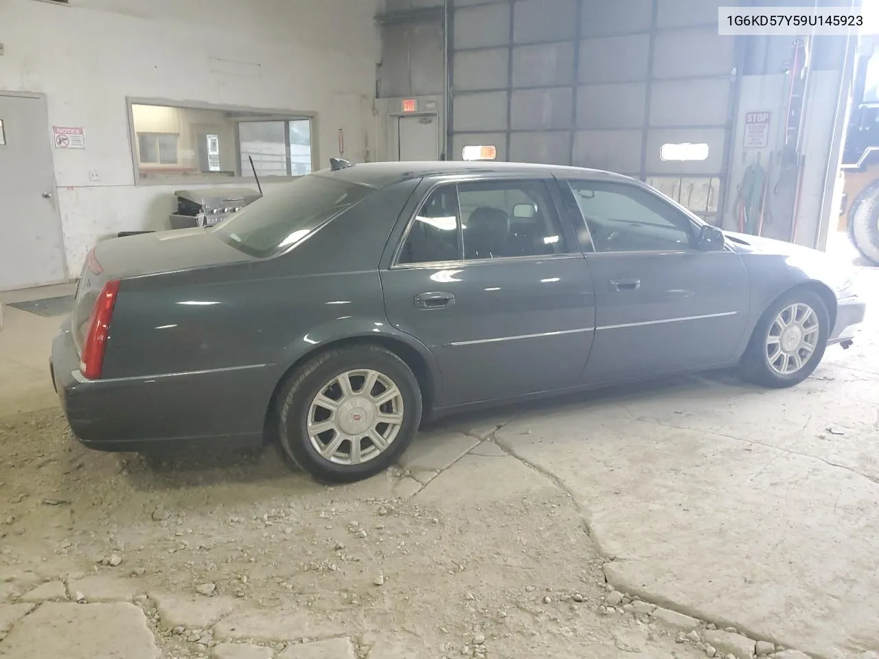 2009 Cadillac Dts VIN: 1G6KD57Y59U145923 Lot: 59552514