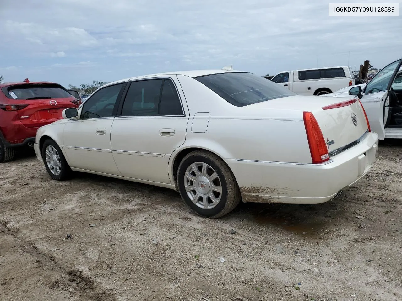 2009 Cadillac Dts VIN: 1G6KD57Y09U128589 Lot: 74114284