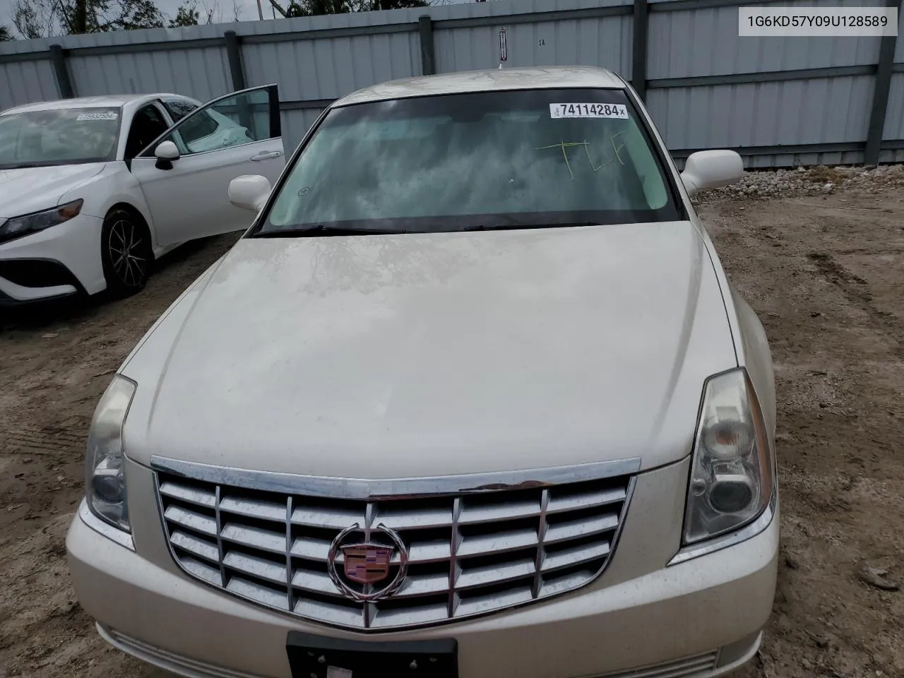 2009 Cadillac Dts VIN: 1G6KD57Y09U128589 Lot: 74114284