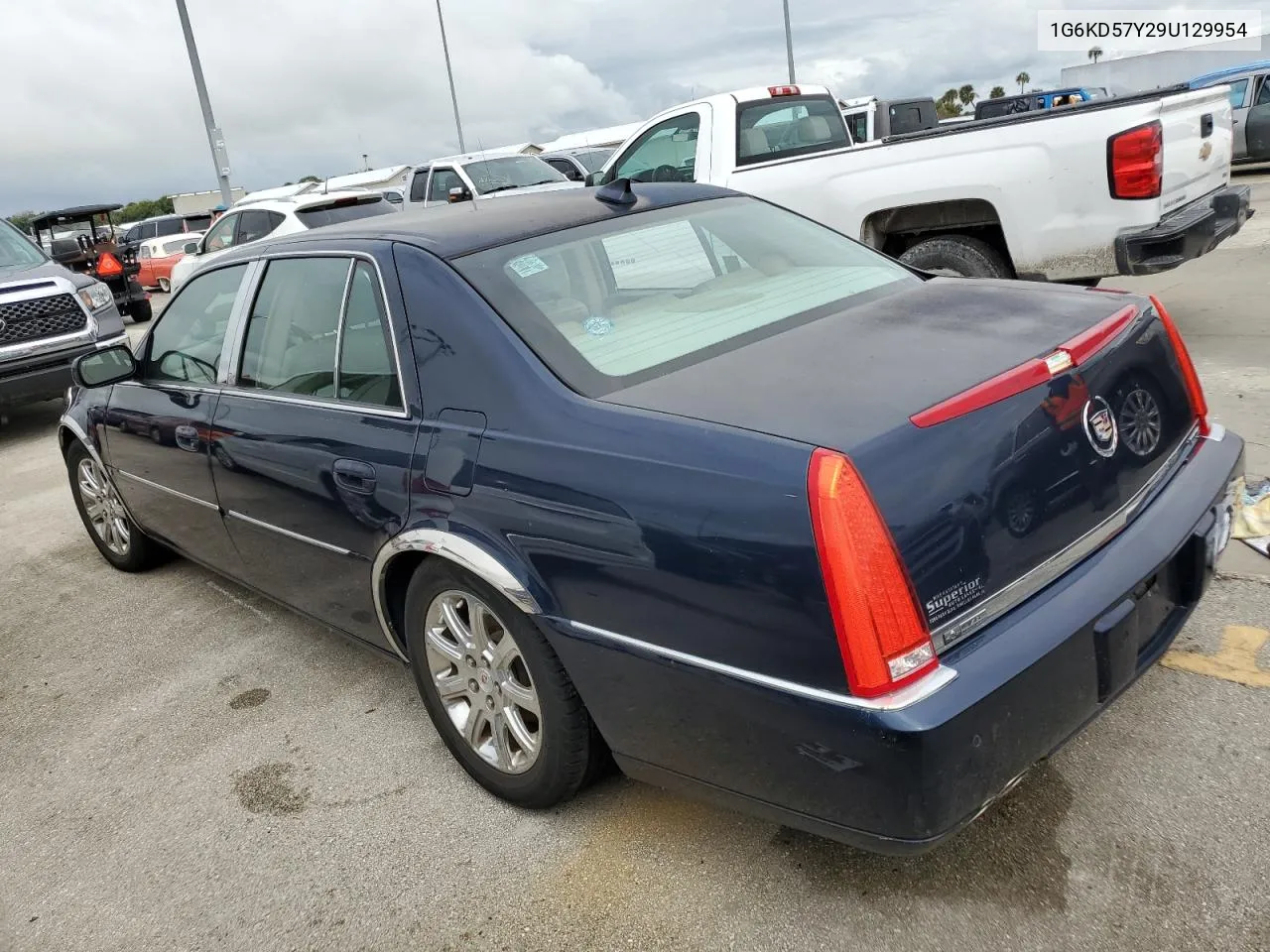 2009 Cadillac Dts VIN: 1G6KD57Y29U129954 Lot: 74135424