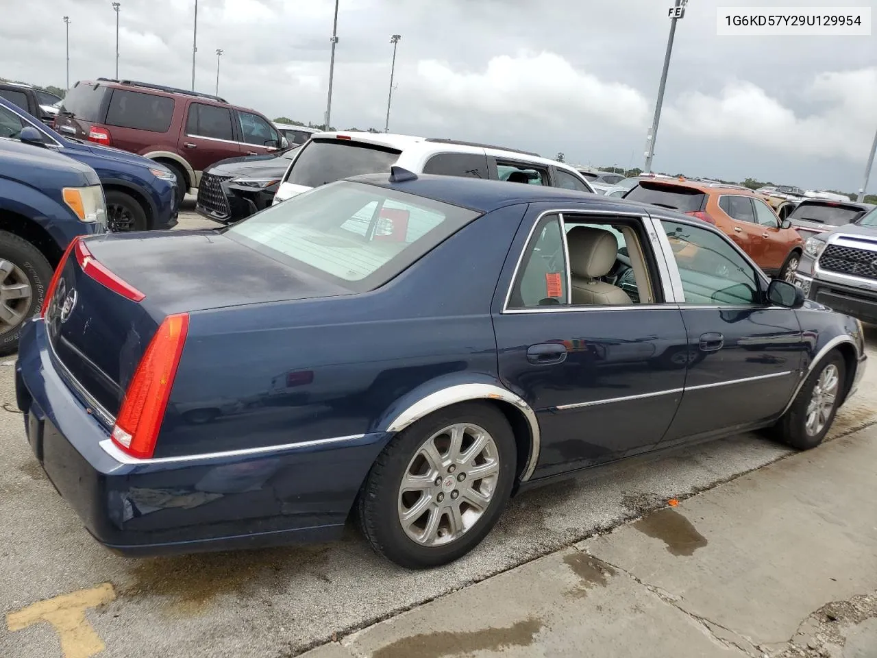 2009 Cadillac Dts VIN: 1G6KD57Y29U129954 Lot: 74135424