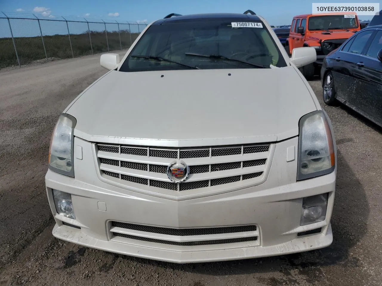 2009 Cadillac Srx VIN: 1GYEE637390103858 Lot: 75007174