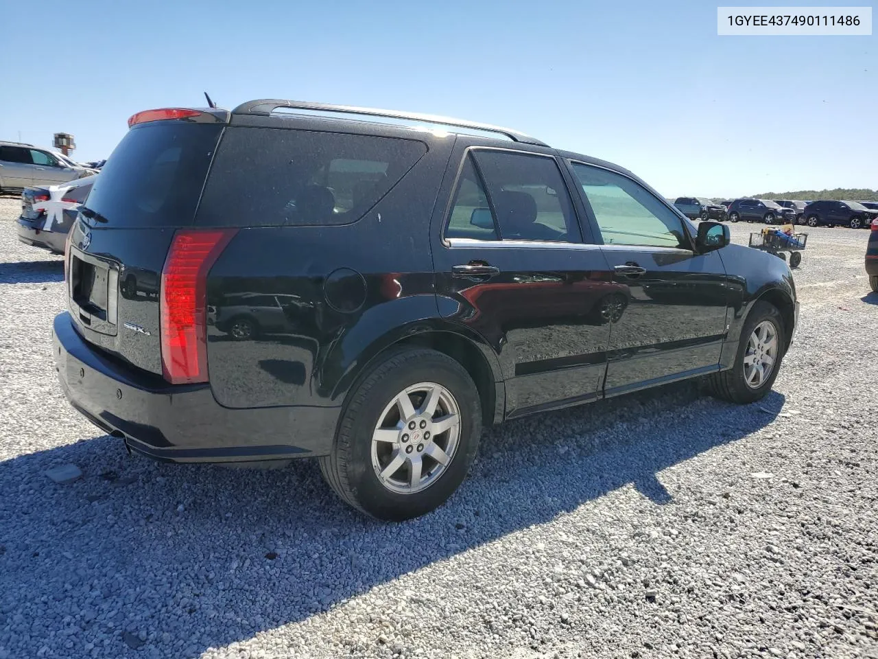 2009 Cadillac Srx VIN: 1GYEE437490111486 Lot: 75403394