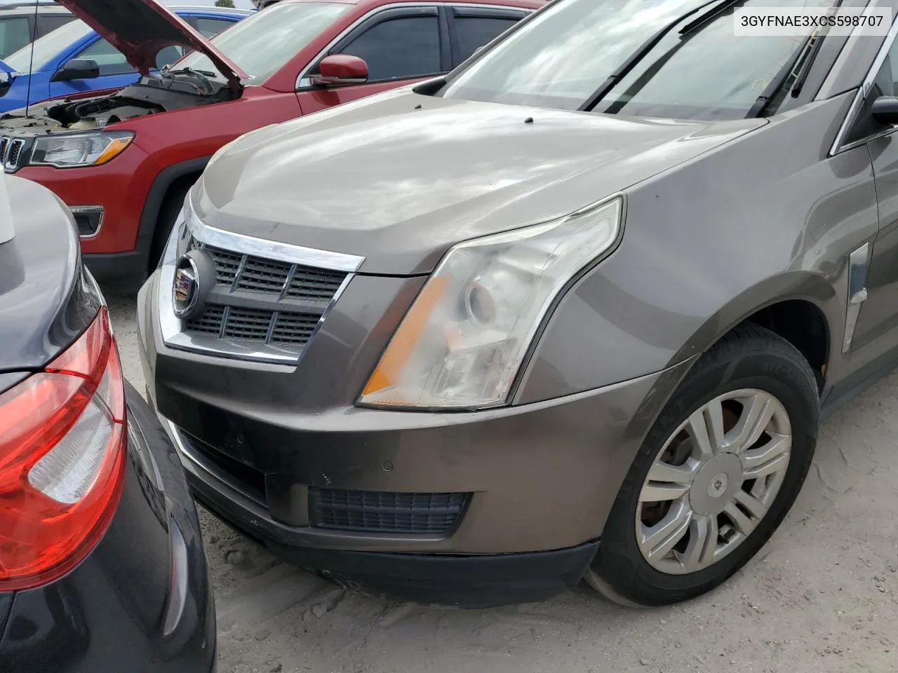 2012 Cadillac Srx Luxury Collection VIN: 3GYFNAE3XCS598707 Lot: 76696474