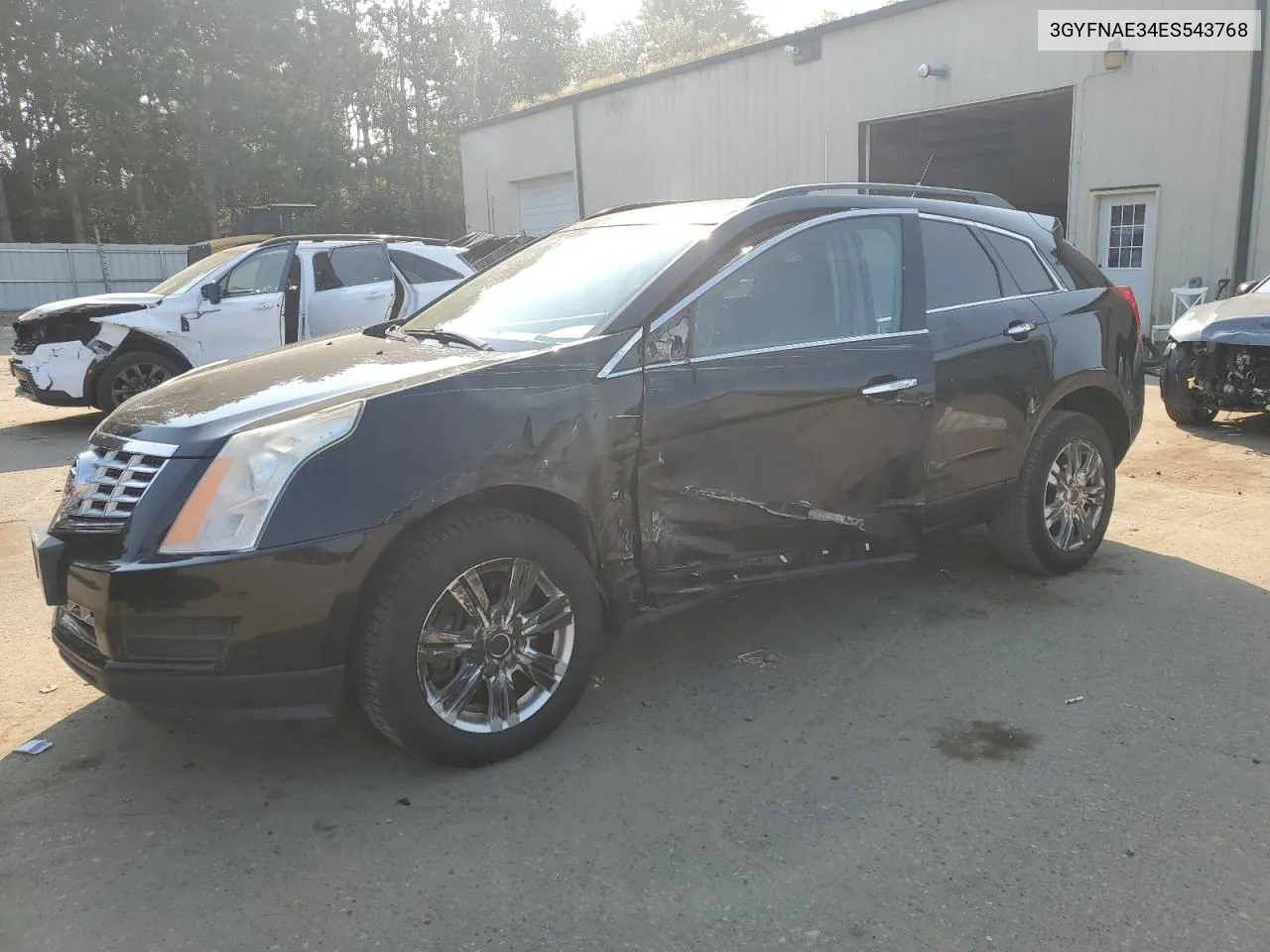 2014 Cadillac Srx VIN: 3GYFNAE34ES543768 Lot: 70830974