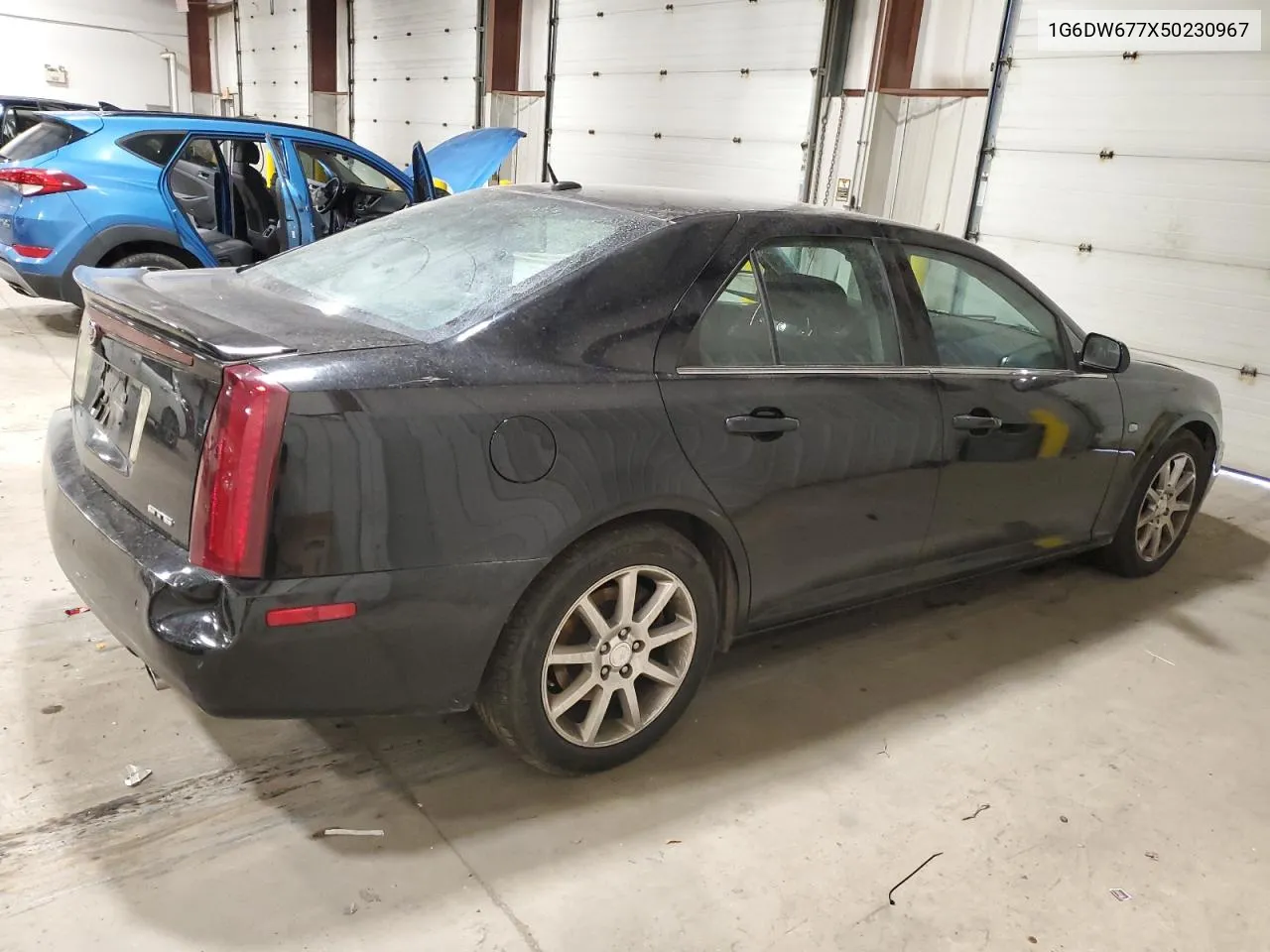 2005 Cadillac Sts VIN: 1G6DW677X50230967 Lot: 76903503