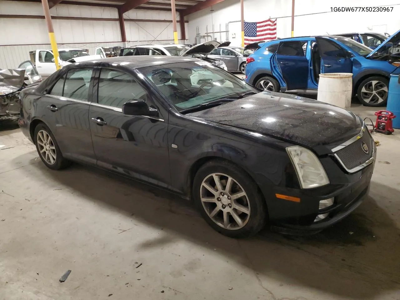 2005 Cadillac Sts VIN: 1G6DW677X50230967 Lot: 76903503