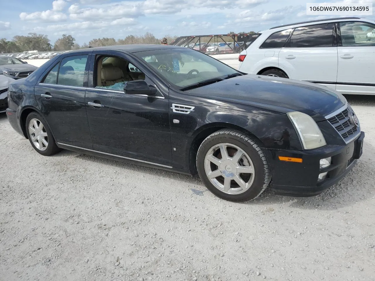 2009 Cadillac Sts VIN: 1G6DW67V690134595 Lot: 76619544