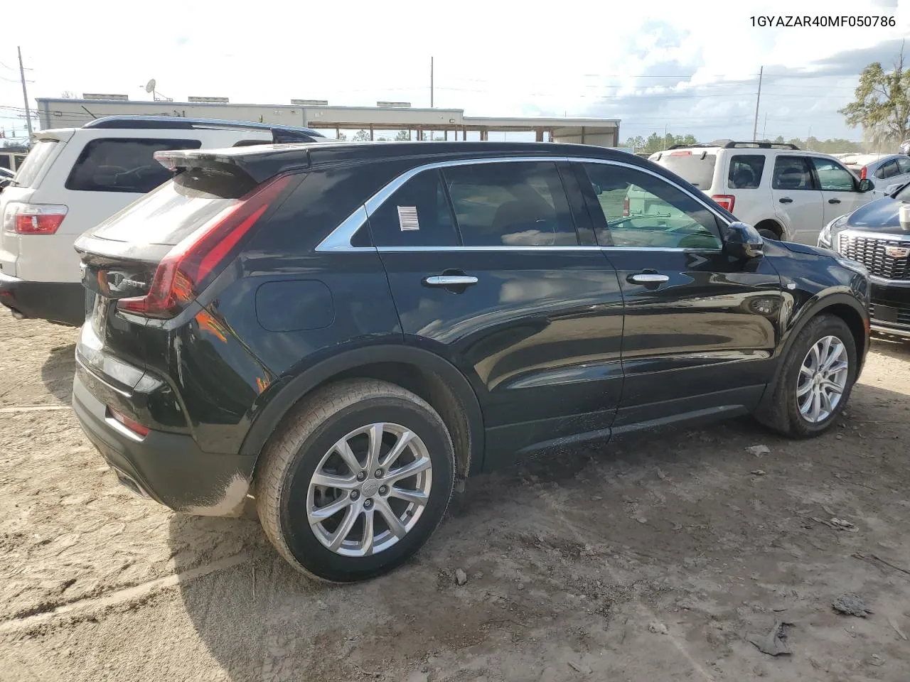 2021 Cadillac Xt4 Luxury VIN: 1GYAZAR40MF050786 Lot: 75005334