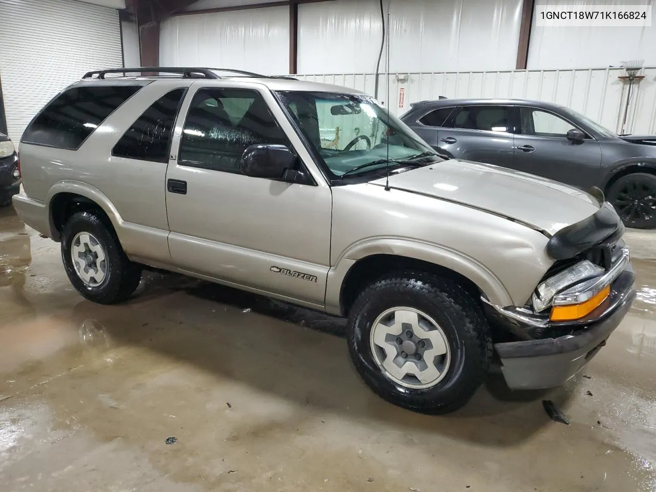 2001 Chevrolet Blazer VIN: 1GNCT18W71K166824 Lot: 74954344