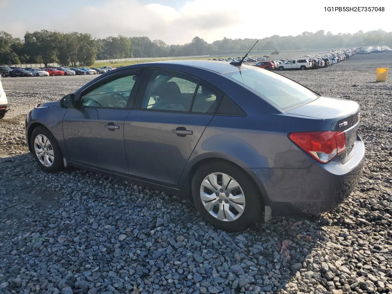 2014 Chevrolet Cruze Ls VIN: 1G1PB5SH2E7357048 Lot: 73791804