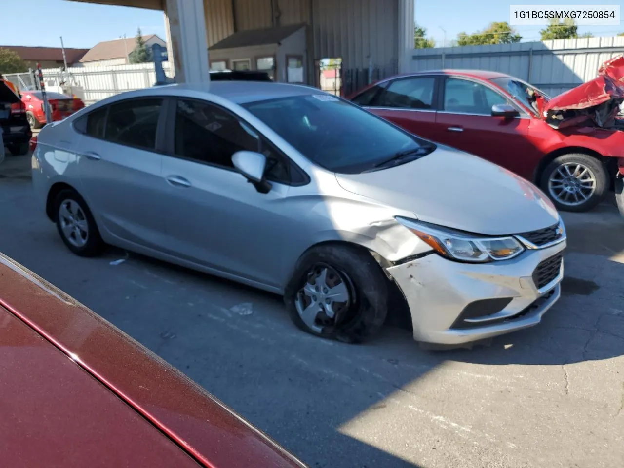 2016 Chevrolet Cruze Ls VIN: 1G1BC5SMXG7250854 Lot: 68975474