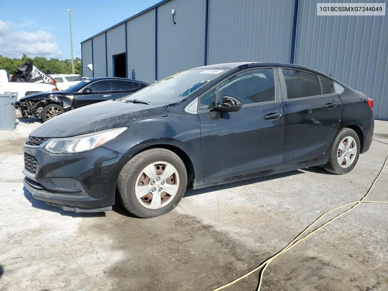 2016 Chevrolet Cruze Ls VIN: 1G1BC5SMXG7244049 Lot: 72237694