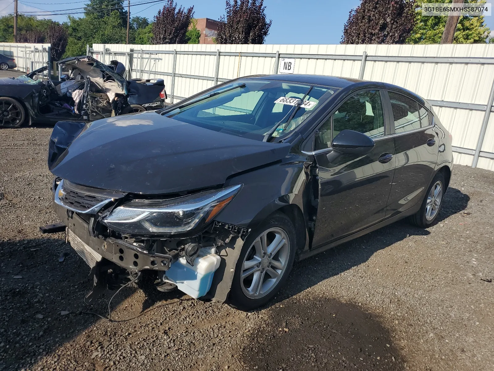 2017 Chevrolet Cruze Lt VIN: 3G1BE6SMXHS587074 Lot: 68331434