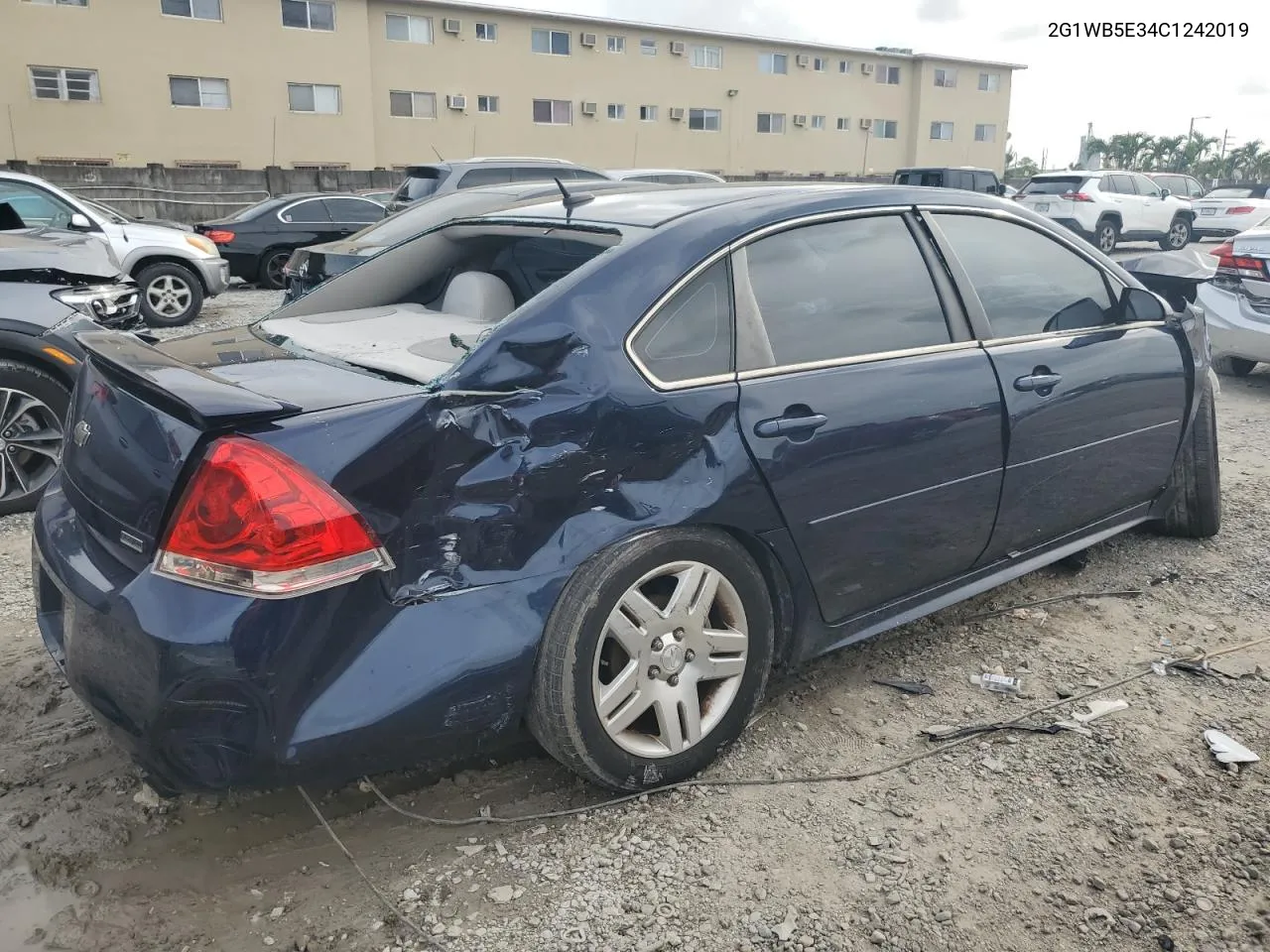 2012 Chevrolet Impala Lt VIN: 2G1WB5E34C1242019 Lot: 70305274