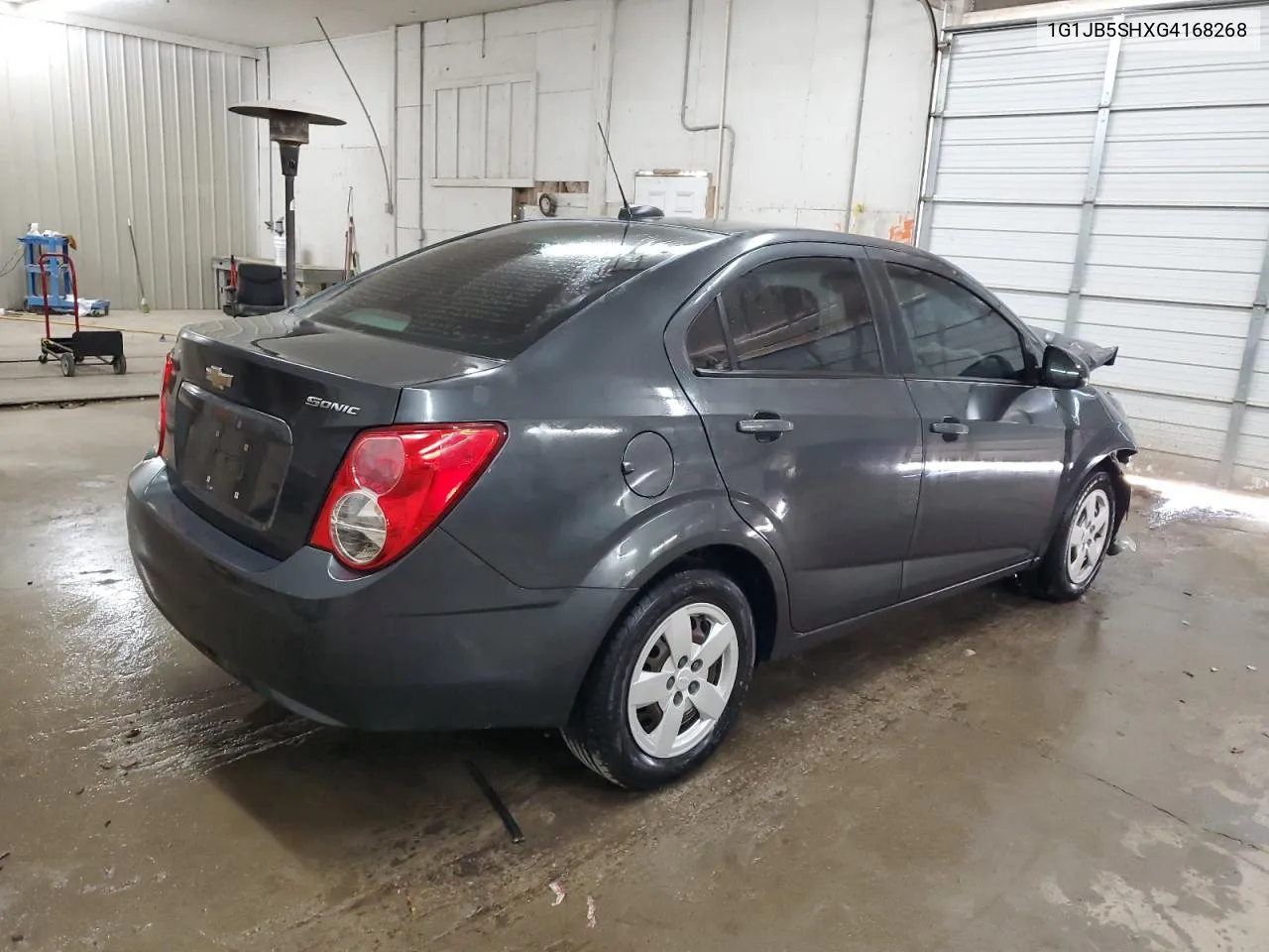 2016 Chevrolet Sonic Ls VIN: 1G1JB5SHXG4168268 Lot: 77386854