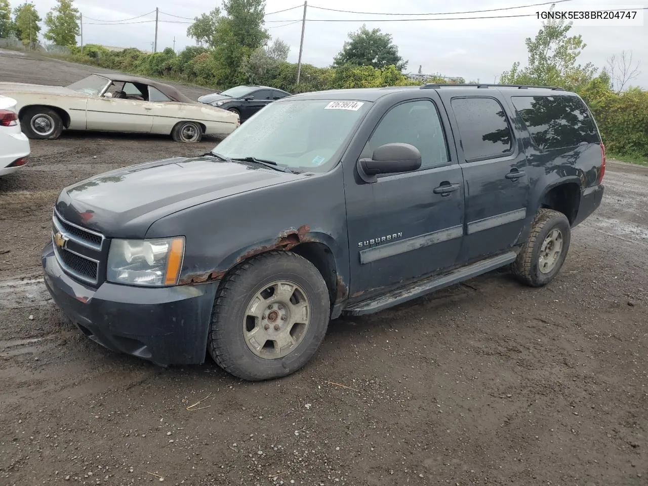 2011 Chevrolet Suburban K1500 VIN: 1GNSK5E38BR204747 Lot: 72679974