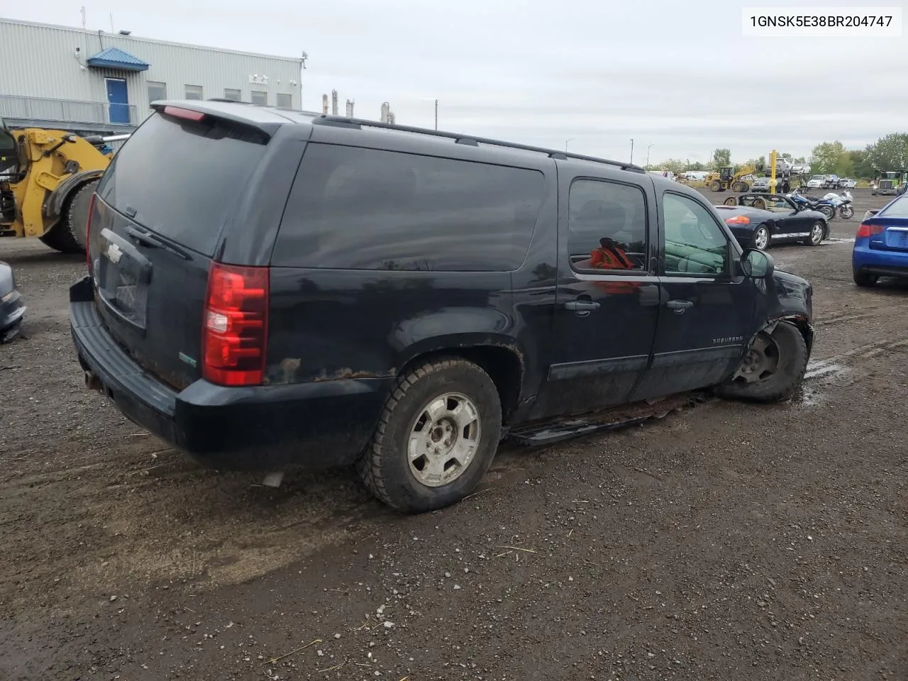 2011 Chevrolet Suburban K1500 VIN: 1GNSK5E38BR204747 Lot: 72679974