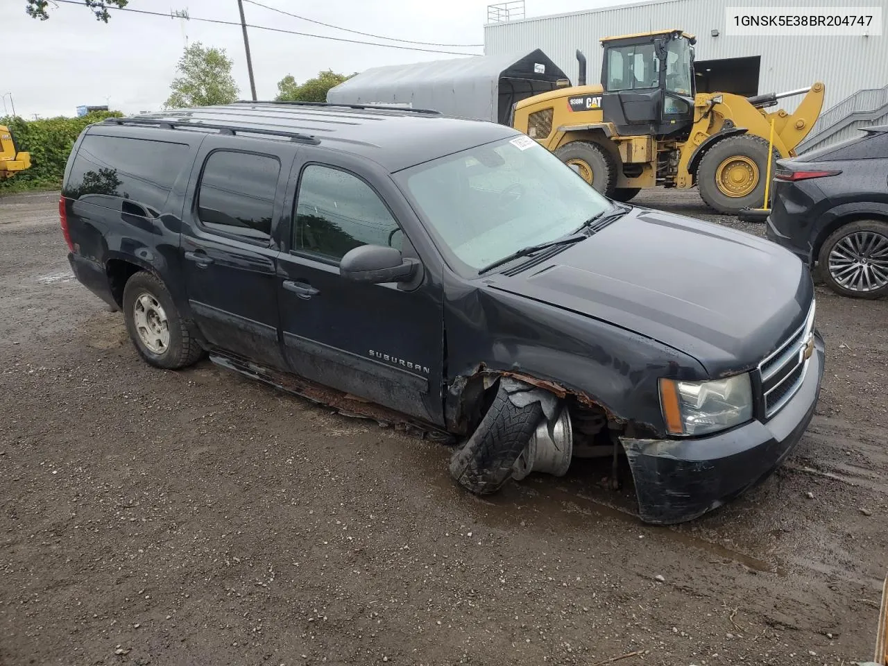 2011 Chevrolet Suburban K1500 VIN: 1GNSK5E38BR204747 Lot: 72679974