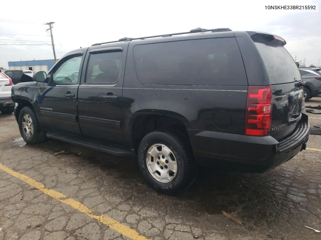 2011 Chevrolet Suburban K1500 Ls VIN: 1GNSKHE33BR215592 Lot: 73824354