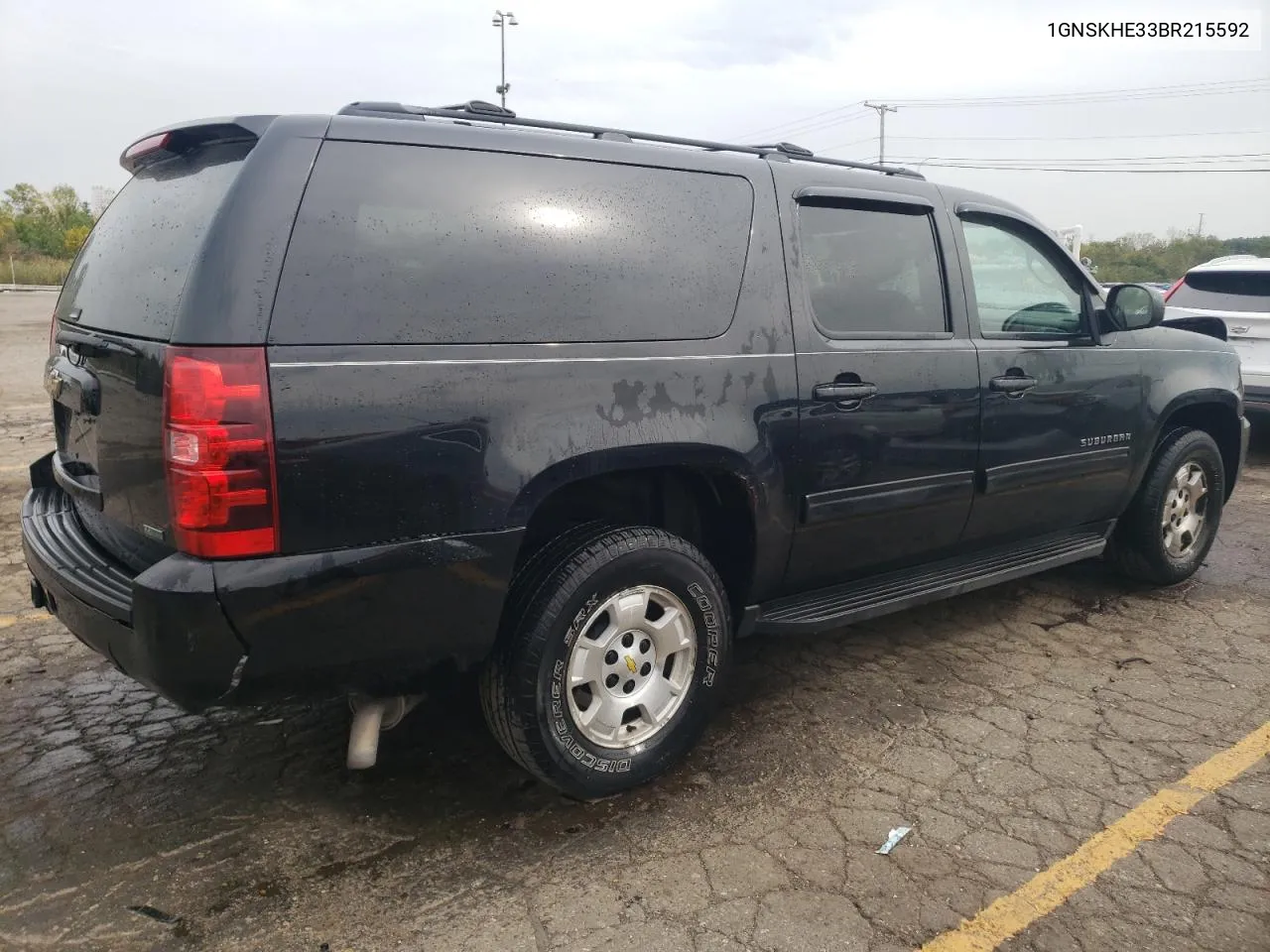 2011 Chevrolet Suburban K1500 Ls VIN: 1GNSKHE33BR215592 Lot: 73824354