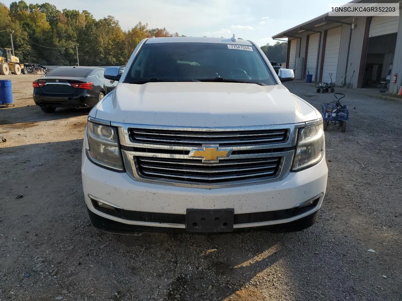 2016 Chevrolet Suburban C1500 Ltz VIN: 1GNSCJKC4GR352203 Lot: 77547534