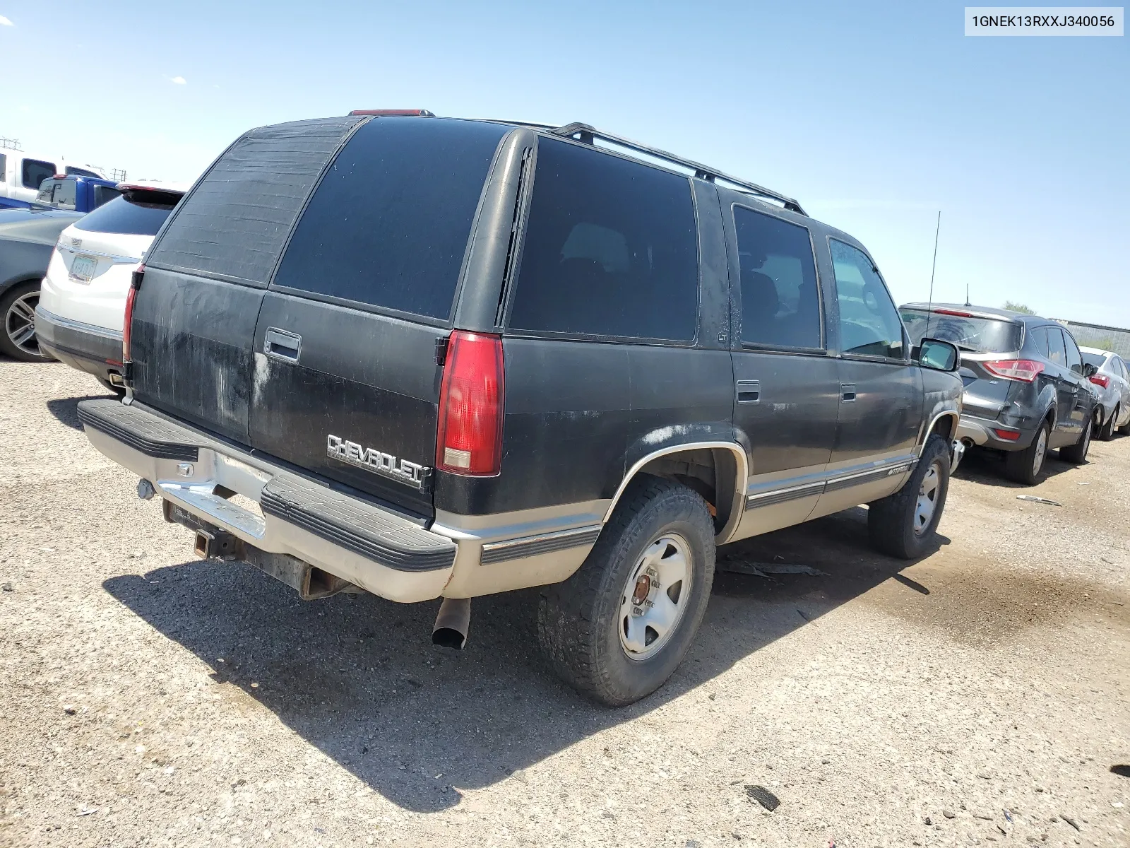 1999 Chevrolet Tahoe K1500 VIN: 1GNEK13RXXJ340056 Lot: 64018874