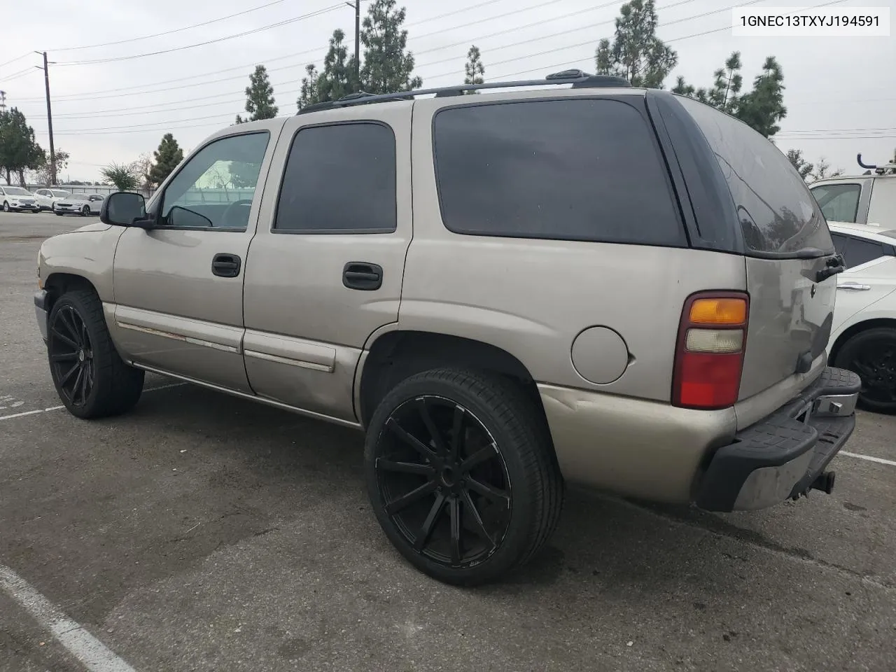 2000 Chevrolet Tahoe C1500 VIN: 1GNEC13TXYJ194591 Lot: 76772504