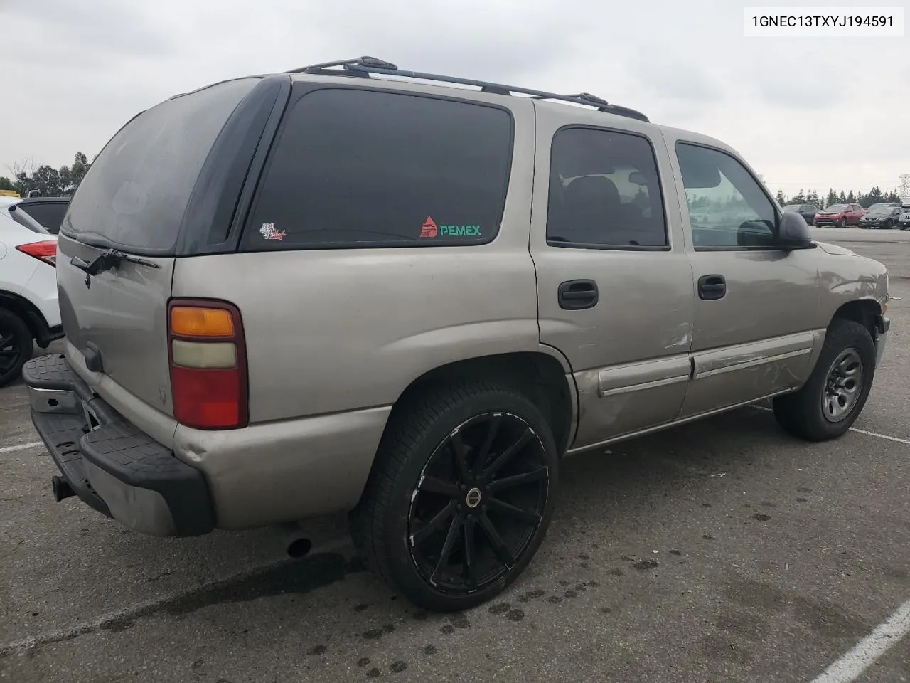 2000 Chevrolet Tahoe C1500 VIN: 1GNEC13TXYJ194591 Lot: 76772504