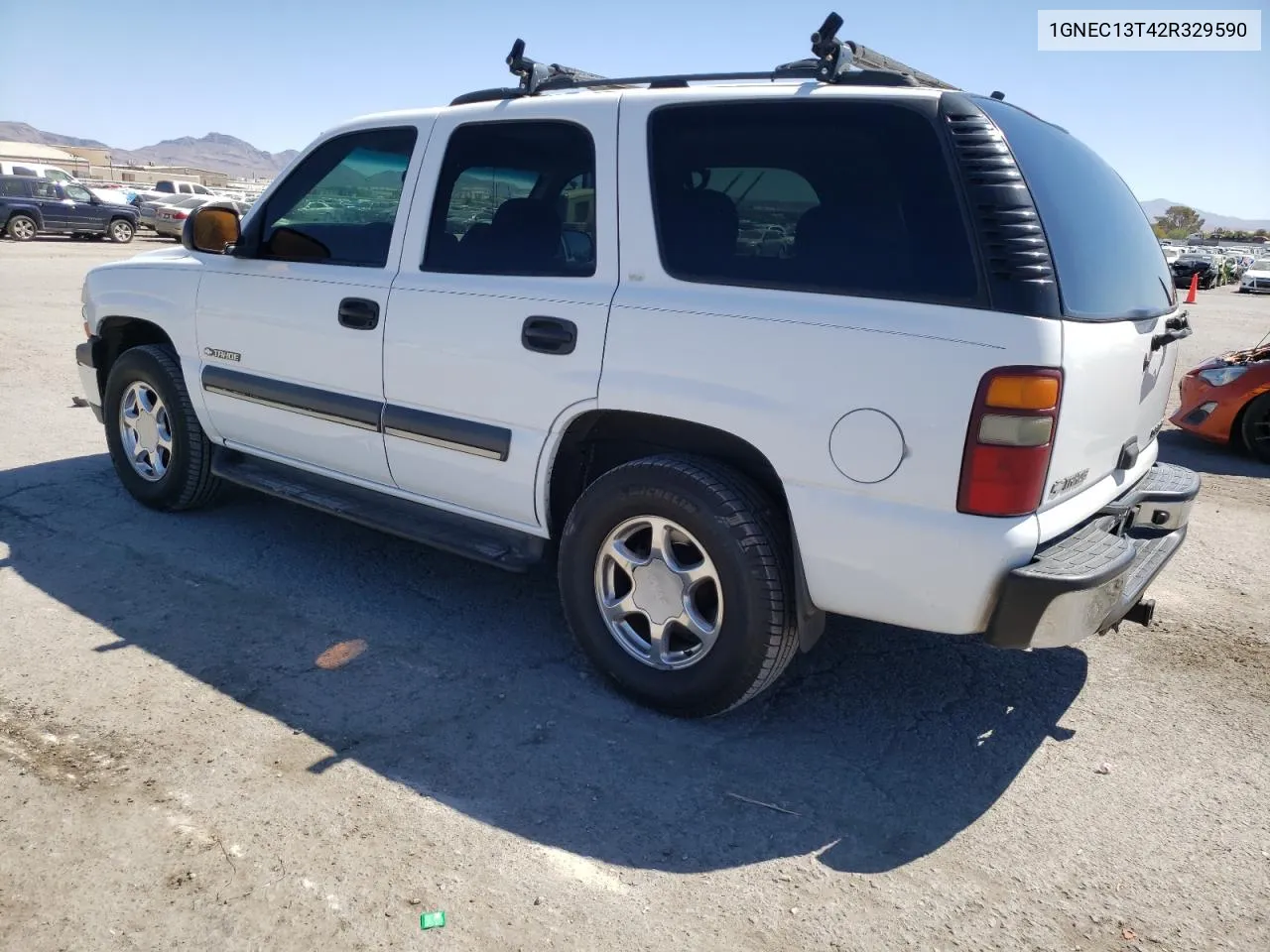 2002 Chevrolet Tahoe C1500 VIN: 1GNEC13T42R329590 Lot: 67769504