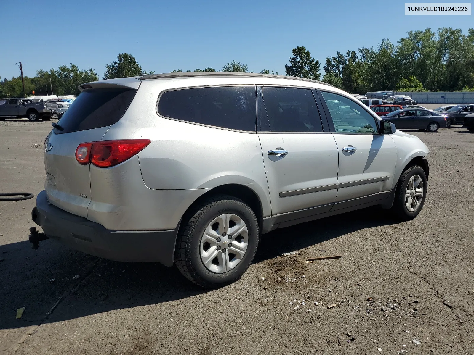 2011 Chevrolet Traverse Ls VIN: 1GNKVEED1BJ243226 Lot: 64025964