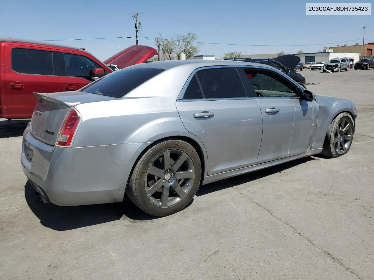 2013 Chrysler 300 Srt-8 VIN: 2C3CCAFJ8DH735423 Lot: 70628524